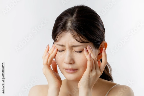 Fototapeta 頭痛に悩む若い女性