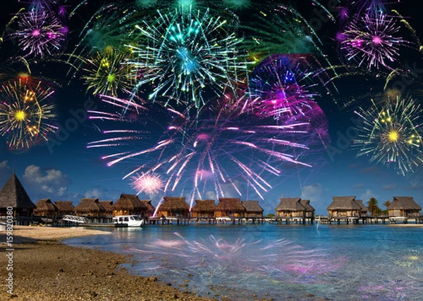 Obraz Bright festive fireworks over the sea and the beach