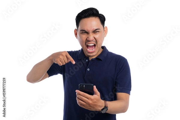 Fototapeta Angry man shouting and pointing at smartphone while looking frustrated isolated on transparent background