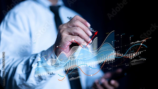 Fototapeta Businessman using pen touch holographic graphs and stock market statistics gain profits. Stock market price increase. Stock market investment analysis, financial risk management and investment.