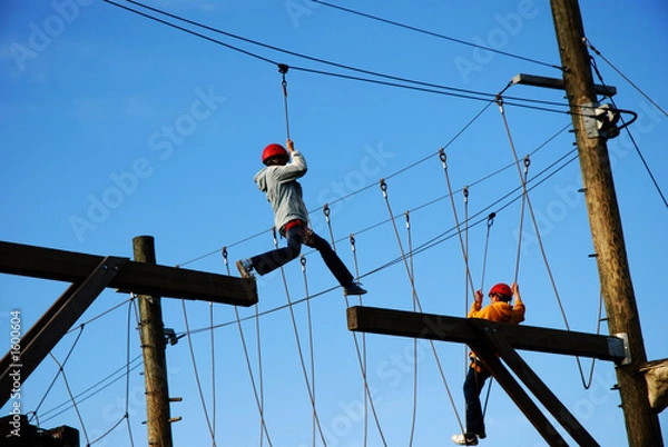 Obraz boy making a risky jump at an amusement park