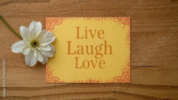 Fototapeta Inspirational message card adorned with blooming flowers on a bright yellow surface