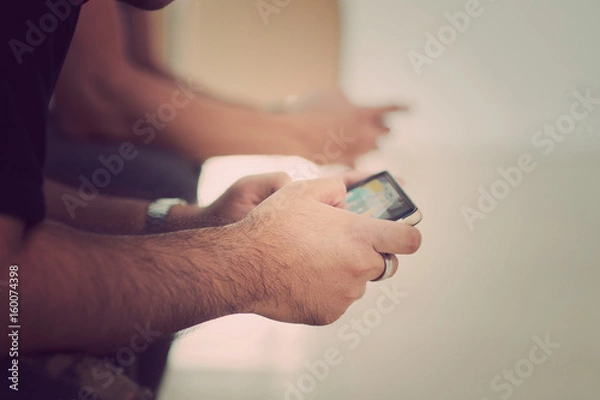 Fototapeta women typing smartphone close  up
