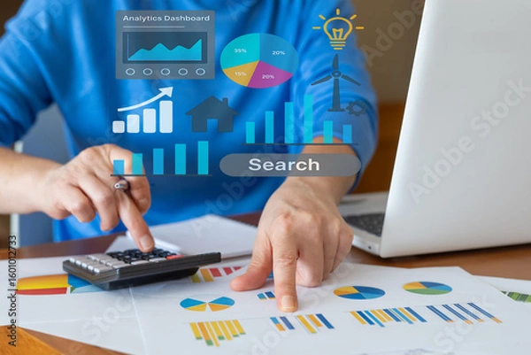 Fototapeta Businessman using a calculator and pointing at financial charts, analyzing data with a digital interface showcasing growth metrics, highlighting business intelligence concepts