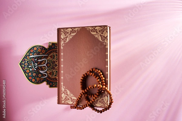 Fototapeta top view of koran stand with prayer beaads and holy koran.