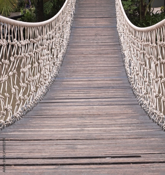 Fototapeta Hängebrücke über Fluß