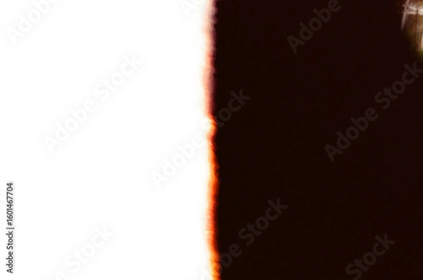 Fototapeta Surreal abstract black and white contrasts and textures created naturally by a 35mm film burn. Perfect for designs needing a vibrant artistic background or creative element to attract attention.