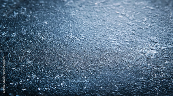 Fototapeta Wet textured surface with blue lighting and water droplets, close-up abstract macro background with rough grunge texture and shiny moisture effect.