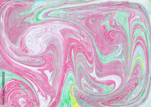 Fototapeta Abstract pink green ebru background. Bright iridescences of paint on the water. A creative artistic background for graphic design. Multi-colored shades of colors mixing. Fluid texture Contemporary art
