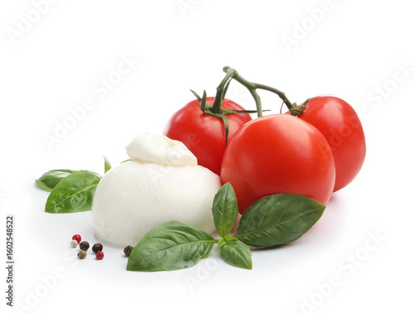 Fototapeta Tasty mozzarella cheese ball, tomatoes, basil and peppercorns isolated on white