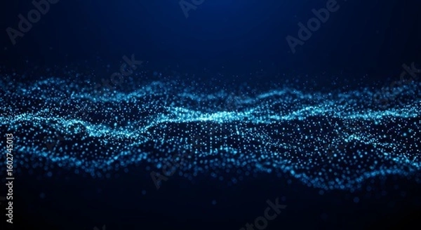Fototapeta A mesmerizing abstract digital wave composed of countless glowing blue particles shimmering against a dark deep blue background