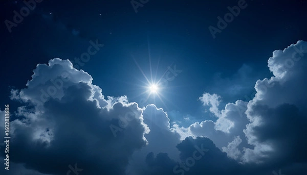 Fototapeta Dramatic Moonlit Night Sky with Glowing Clouds