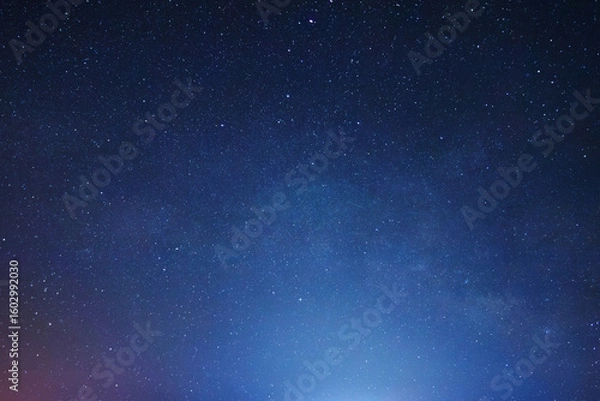 Fototapeta breathtaking view of the night sky filled with countless stars and constellations, capturing the vastness and beauty of the universe in deep space. Perfect for astronomy and cosmic themes