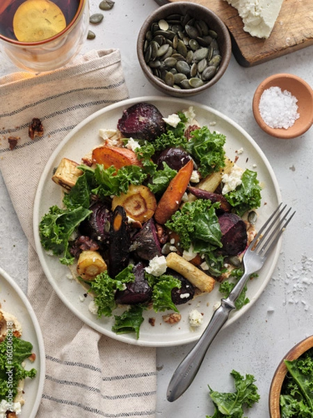 Fototapeta Top view healthy vegetarian dinner with root vegetables salad