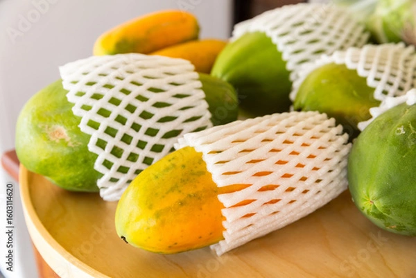 Obraz Papaya with packing foam