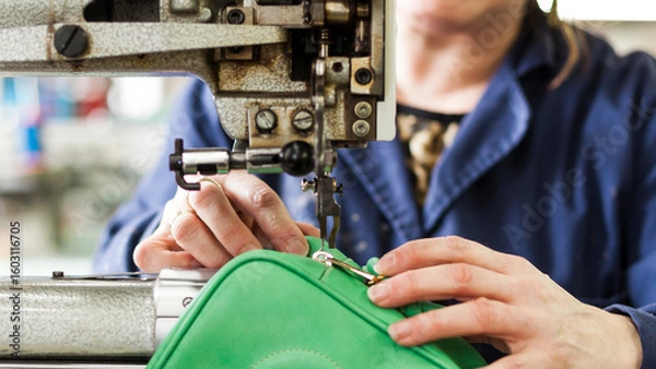 Obraz Leather sewing process with industrial machine in workshop