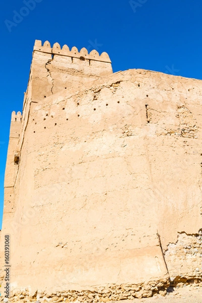 Fototapeta in oman    muscat    the   old defensive  fort battlesment sky and  star brick