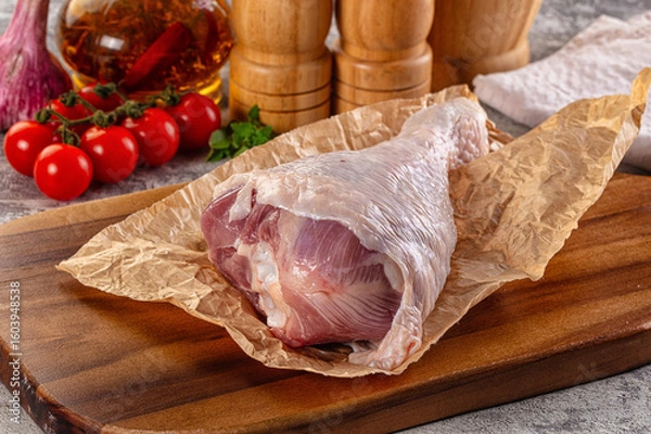 Fototapeta Raw uncooked turkey leg drumstick