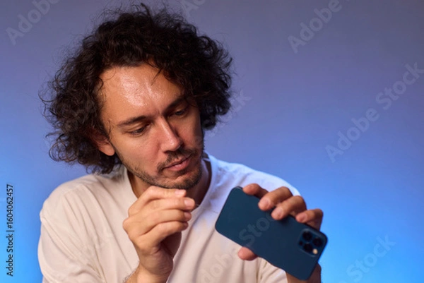 Fototapeta The Innovative Smartphone Cleaning Device is Being Demonstrated During Use and Functionality
