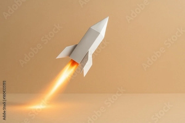 Obraz White rocket launching with flames on beige background used in startup success visuals business launch and innovation concepts