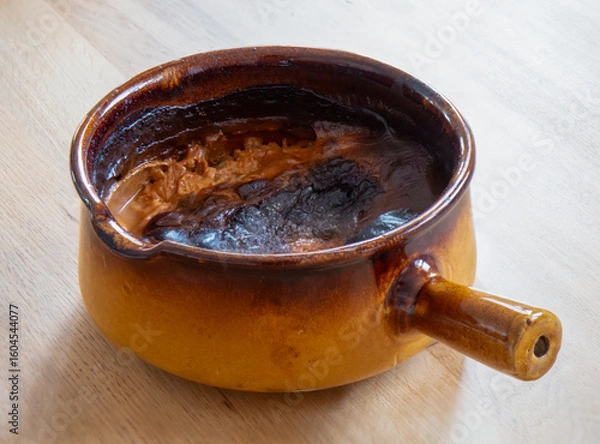 Obraz Riz au lait dans jatte en terre cuite