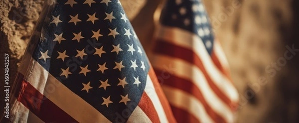 Fototapeta The American flags displaying pride and heritage in a vintage setting.