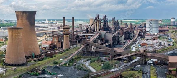 Fototapeta Scunthorpe Steel works in the United Kingdom. Blast Furnaces from British Steel production in the UK.  Aerial view of the large metal works in Lincolnshire