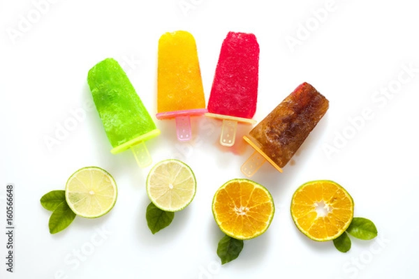 Fototapeta flat lay style of handmade ice cream with lime and orange fruit on white background.