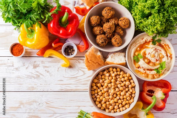 Fototapeta Falafel, pita, hummus and chickpea  with vegetables. Top view