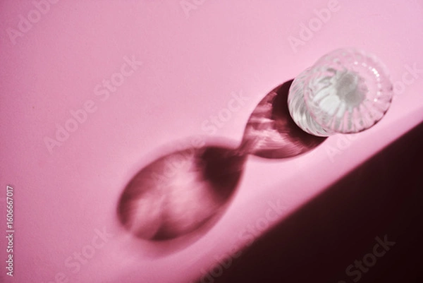Fototapeta top view hourglass against pink background with copoy space.