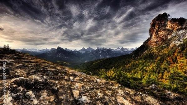 Fototapeta Vibrant summer panorama of mountain landscapes with green valleys, snow-dusted peaks, and stunning waterfalls under a clouded sky