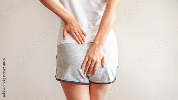 Obraz Person with hemorrhoids and constipation