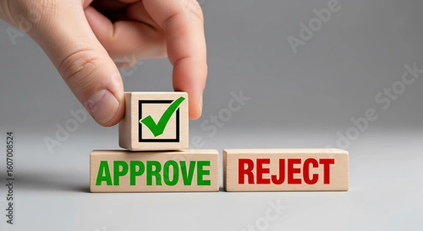Obraz Hand placing approval block on approve reject cubes