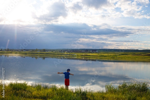 Obraz Lone child over the lake