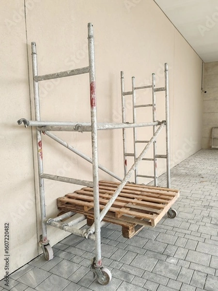 Obraz Mobile scaffolding, Portable move able scaffolding.
Scaffolding Erected for Construction Building.
Safety mobile Scaffolding Protection 