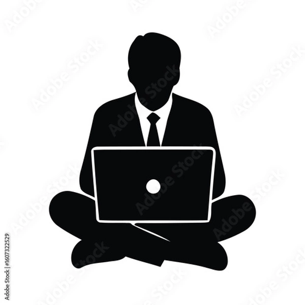 Fototapeta Silhouette of a businessman working on a laptop in a lotus position