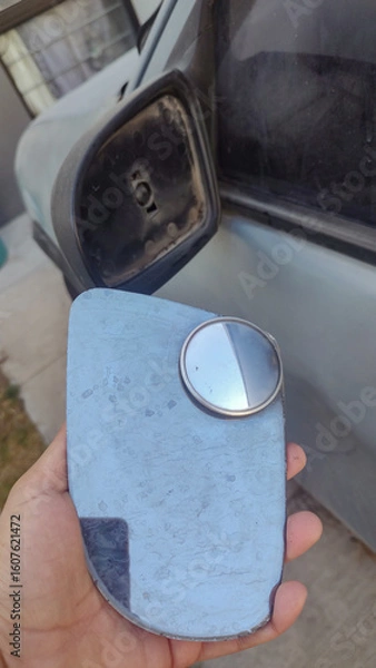 Obraz Broken driver's rearview mirror, damaged left rearview mirror.