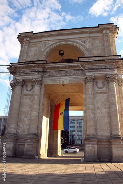 Obraz Victory Arch in Chisinau in the evening, illuminated by the sun.