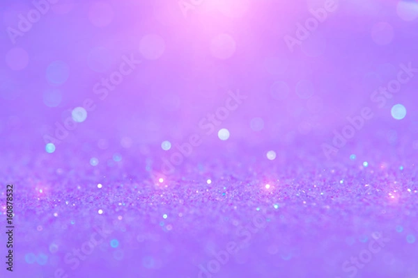 Fototapeta Soft violet or purple bokeh light is the soft blurred circles of light white and light purple . Winter Christmas and valentine background  wallpaper concept