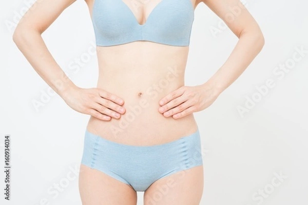 Obraz 女性のお腹