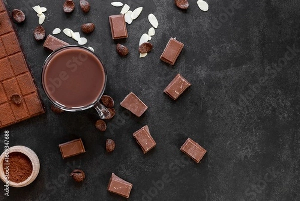 Fototapeta chocolate cocoa and various chocolatey dessert with black background 