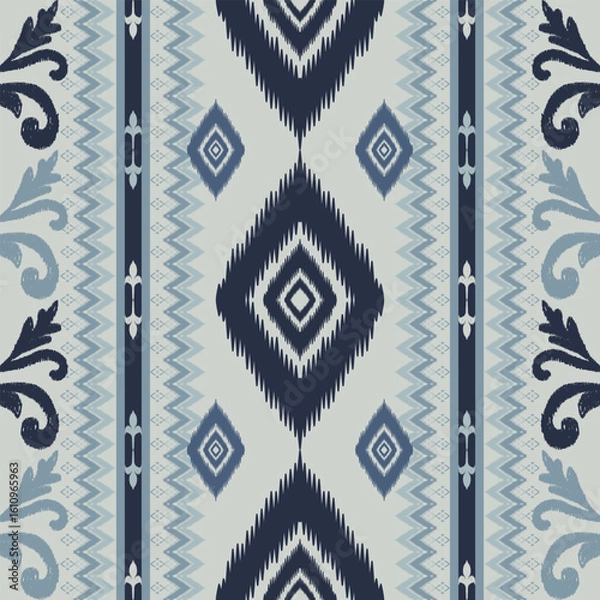 Fototapeta Seamless indigo ikat patterns in ethnic tribal style, featuring geometric diamond shapes and woven texture in blue tones.