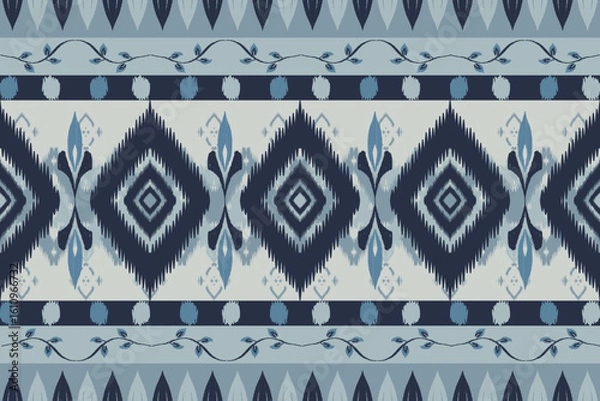 Fototapeta Seamless indigo ikat patterns in ethnic tribal style, featuring geometric diamond shapes and woven texture in blue tones.