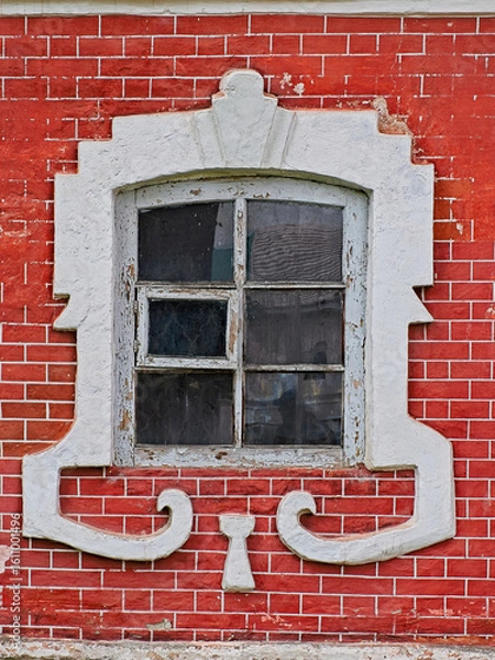 Obraz An old white window in a red brick wall