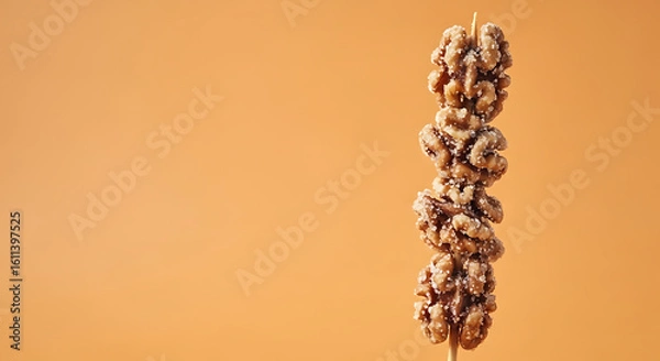 Fototapeta Chocolate Granola Energy Bars Stack on Orange Background