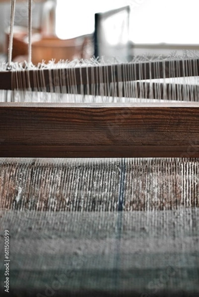 Fototapeta Close up image of a tapestry being created on an old loom