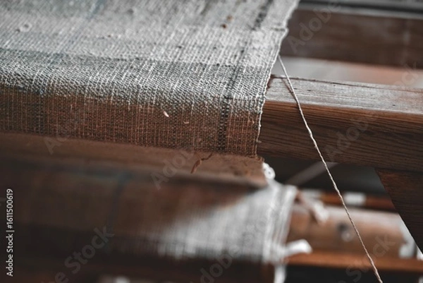 Fototapeta Close up image of a tapestry being created on an old loom