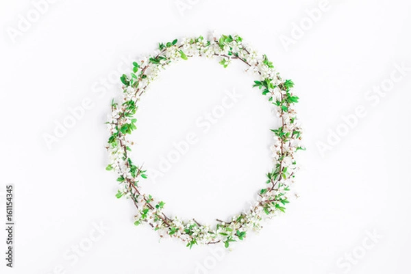 Fototapeta Flowers composition. Frame made of apple tree flowers on white background. Flat lay, top view
