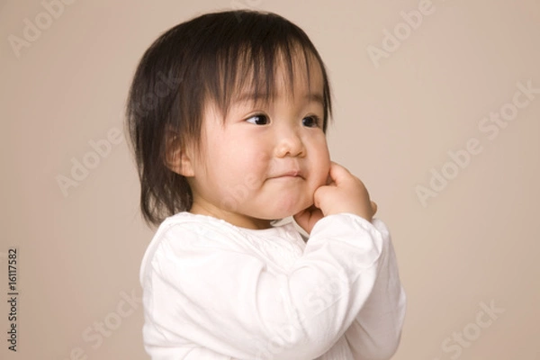 Fototapeta 悩んでいる赤ちゃん