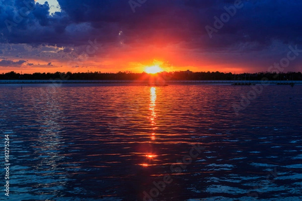 Fototapeta Buffalo NY sunset in springtime looking over Lake Erie from park system